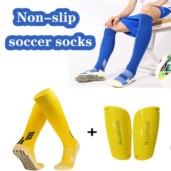 Un set di calzini da calcio non slip professionisti per bambini adulti per bambini lunghi calzini sportivi shin shin cuscs sports protezione 240418