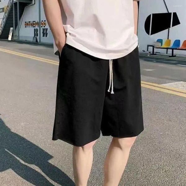 Shorts maschile uomini casual elastica spiaggia corse con tasche pantaloni corti a gamba larga di colore solido per streetwear