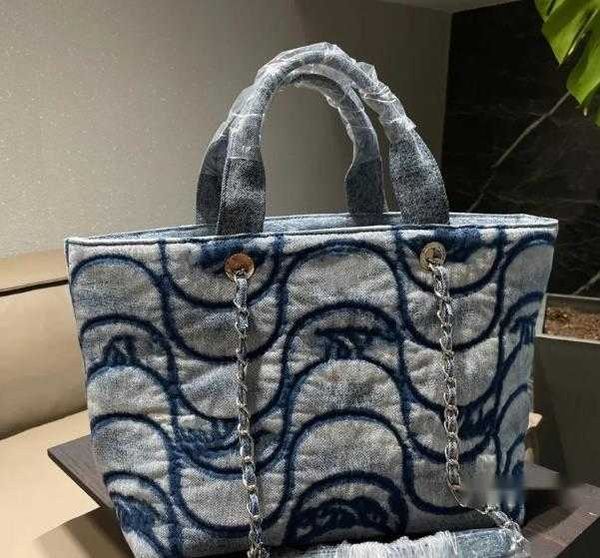 I designer di lusso all'ingrosso hanno lavato la borsa per tote di jeans designer di ragazze pacchetto di shopping di grande capacità famoso marchio famoso