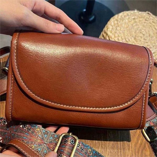 Planta bronzeada Planta Coveiro 2024 Bolsa de ombro de primavera/verão pequena moda e versátil de couro genuíno feminino celular crossbody celular