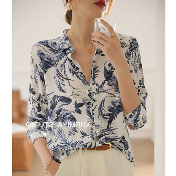 Camicia in chiffon di seta di gelso stampato blu per donne con un senso di design di nicchia versatile a maniche lunghe piccoli