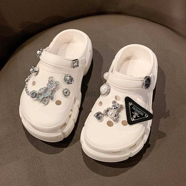 Sandalen verstopfen Neue Kinder Sandalen Mädchen Jungen Baby weiß schwarzer Sommerstrandschubstor Kinder Outdoor lässige Sandalen Wasserschuhe große Größe 240419