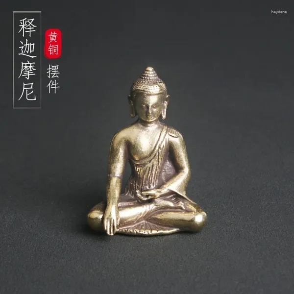 Серьги ожерелья устанавливают латунную медитацию Будды Статуя Шакьямуни поклоняются религиозным идолам на рабочем столе.Домашние аксессуары