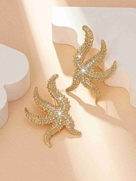 Andere neue Mode übertriebene goldplattierte eingelegte Zirkonoktopus-Ohrringe für Frauen Seestarfish Damen Kristallohrzubehör Schmuck 240419