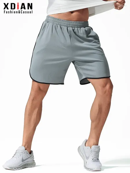 Calça masculina malha de fitness respirável executando shorts de treinamento para desgaste externo