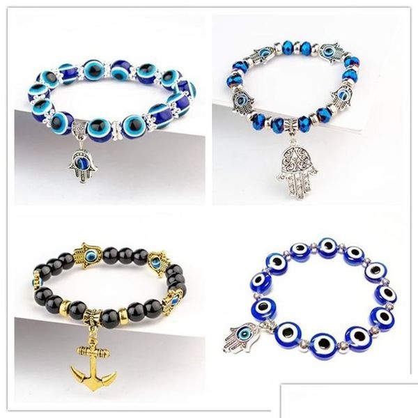 Braccialetti di fascino fatima Hand Hamsa Bracciale gioiello Donne Man Gold Sier Color Fashion Blue Devil Evil Eye Eye Plam Bell Bel Derred BEADED ANCHOR PER DHVU7