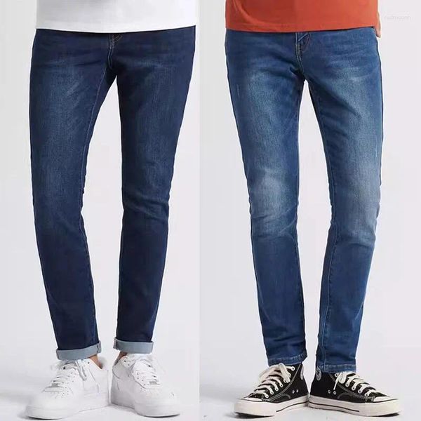 Jeans masculino moda no meio da cintura fina de alongamento de altura alongada calça estreita de calça e solo de solo