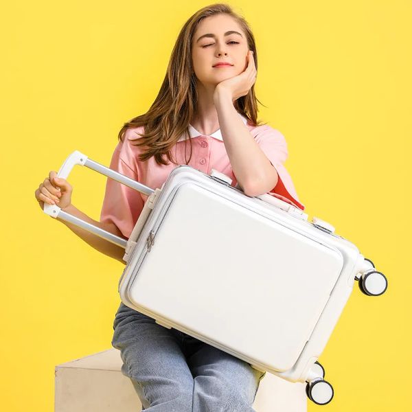 Gepäck Reisekoffer auf Rädern, Frauen modische pinkviolette Verlegerbeutel mit Trolley -Gepäck.