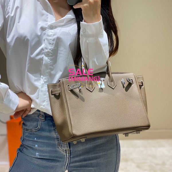 Una borsa di lusso Birknns Nuova Mini 2024 Silver Botton Head Layer Cowhide Fashion Versatile One Spalla Croce portatile Tendenza da donna per pendolare 6HTD NS1Y