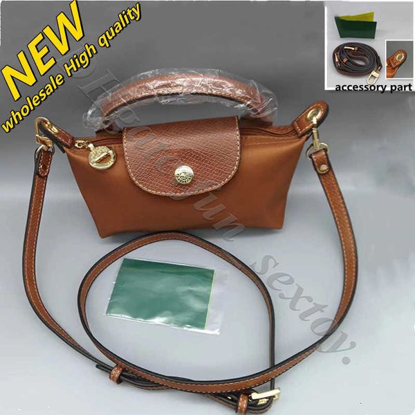 Dumplings Store Wholesale 2024 OFF BANDA HAPELA HAPERAÇÃO Bola barata Fonte de frete Saco de bolsa de qualidade Mini Mini Cognac Leather Women Luxurys Bolsas S8KK