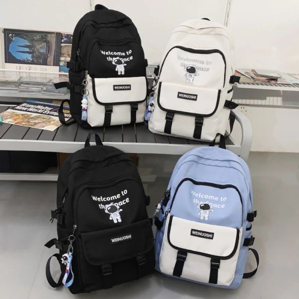 Mochilas Astonauta Print School School Male Junior High School Student simples Filmes de mochila coloridos frios de cores combinando material escolar