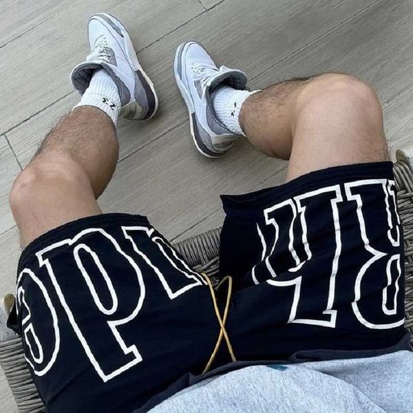 Rhude Letter Stampa High Street American American Casual Basketball Sports Mens Shorts a cinque punti