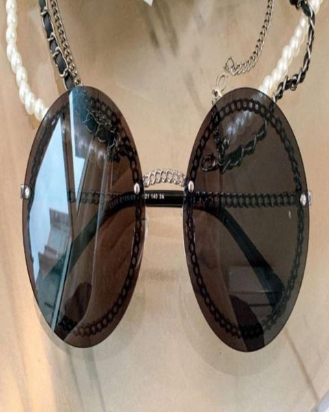 Runde Sonnenbrille Schwarze Champagner Goldkette Randless Shades Frauen Mode -Sonnenbrille mit Box2014326