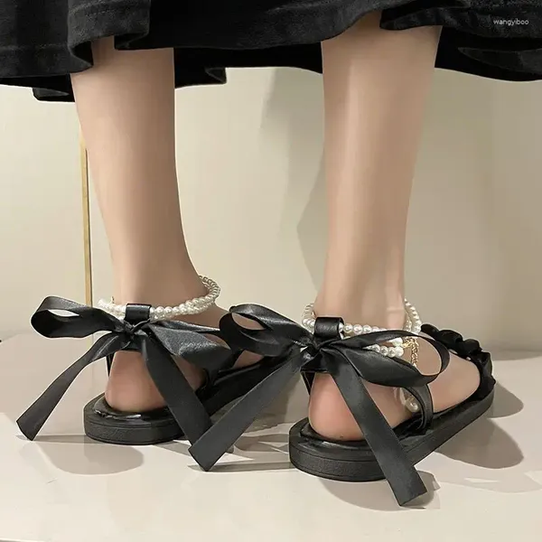 Lässige Schuhe Sommer 2024 Sandalen für Frau flach Gummi ein Wort Perle Frauenschuhe mit Riemen ohne Absatz Komfort Großhandel Verkauf F VIP VIP