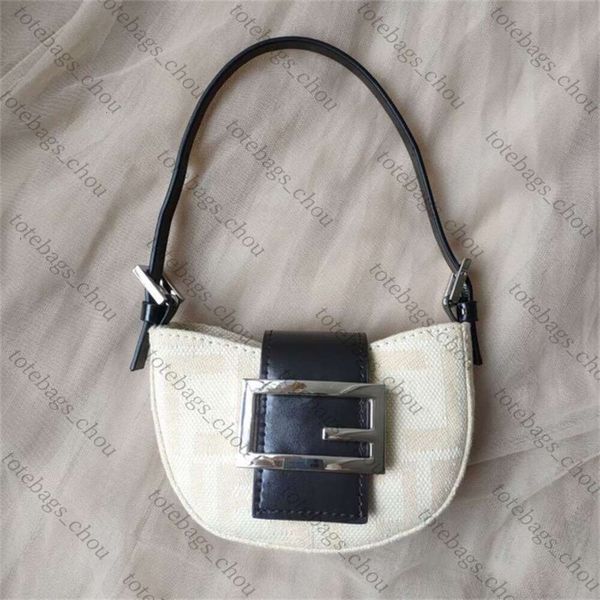 Bolsas de grife 2024 mini lona vintage yuanbao saco de moda casual flor antiga flor de mão pequena bolsa de bolsa zero zague
