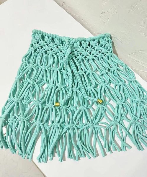 Юбки Beachapche Hand Crochet Tassel Mini Women Fashion Sexy Side Side High вязаные пляжные прикрытия повседневные