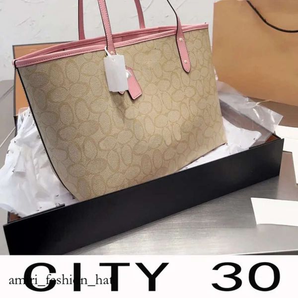 Designer Bolsa Bolsa de ombro de moda de qualidade Mulheres clássicas de lona versátil compras Bolsa de turismo ao ar livre de grande capacidade 2297