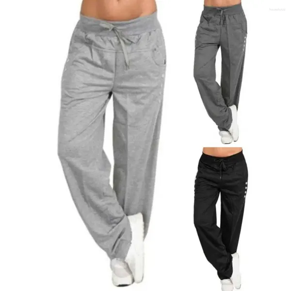 Pantaloni da donna autunno donne invernali che corrono elastico decorazione abbottonatura sciolta di gamba larga gamba da jogging sport sport pantaloni lunghi