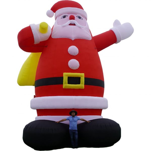 SAPIA GRATUITA GRATUITA GIRANTE GIUSTER CLAUS CLAUS CLAUS BUSH UP PADIO DI NATALE Old Man per la promozione del centro commerciale giocattoli