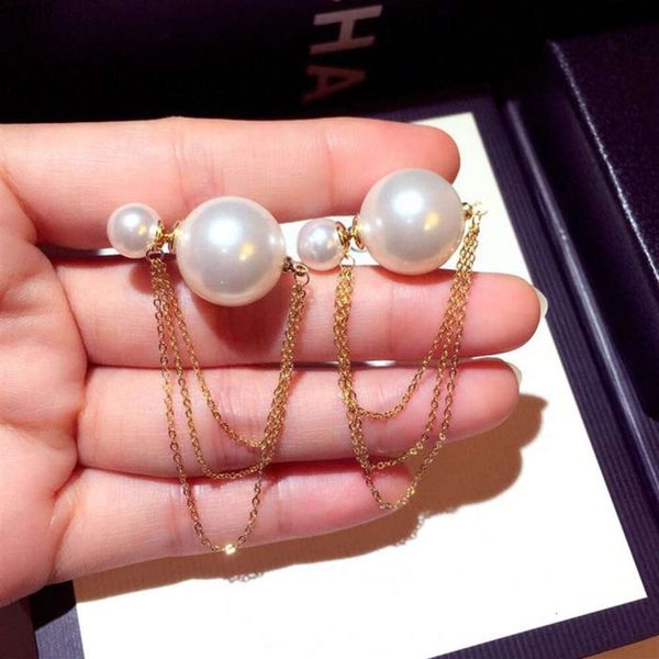 Neue trendige Mode -Luxusdesigner süße schöne doppelseitige Perlenkettenohrringe für Frau