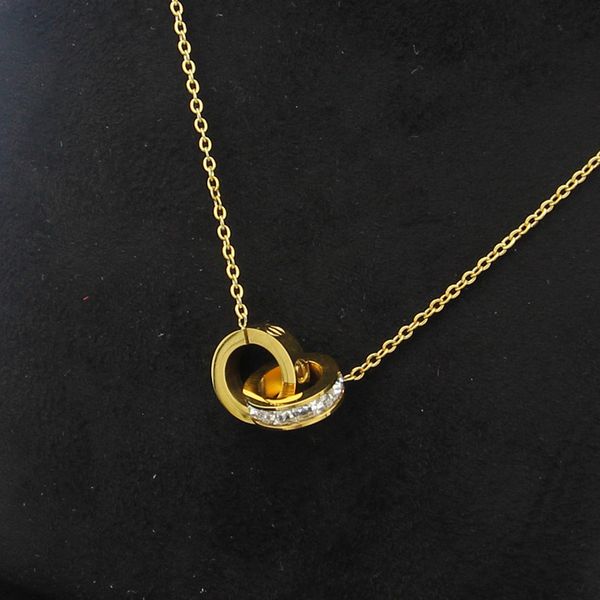 Designer Designer Collana di lusso Colore Gold Doppio anello a ciondolo Love Collane di lusso in acciaio in acciaio Gioielli per ragazzi ragazze per ragazzi