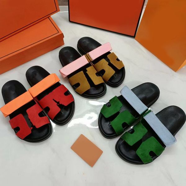 Chypre Slifors Designer Sandals Donne Designer Slides Marci in pelle morbida Slide Fuzzy Plusfle pantoufle arancione arancione Designer estate scarpe piatto piatto Sh09