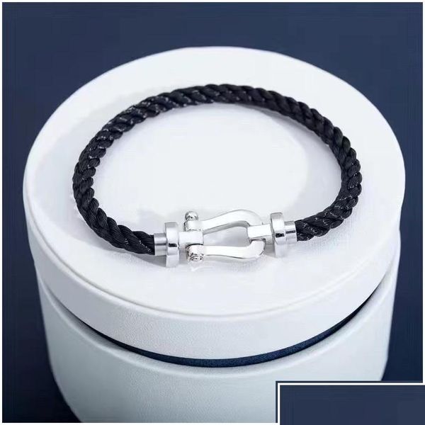 Pulseiras de charme Forças de designer 10 letra de luxo de pulseira Menas de moda feminina jóias clássicas Jóias de alta qualidade Padrão de ferradura Dro dhqke