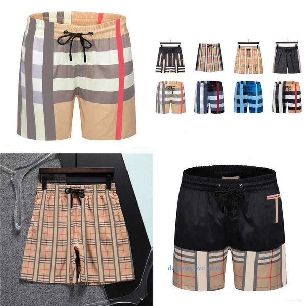 Designer masculino shorts de luxo verão Summer feminino listrado elegante esportes de natação de alta qualidade A moda de praia de roupas de banho seca de alta qualidade designs mensagens curtas calça