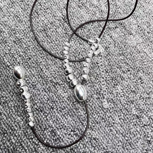 Anhänger 2024 U -Knoten 50 Mode Elektroplattiert 925 Silberperlen kreative schwarze Seil Halskette Schmuckgeschenke