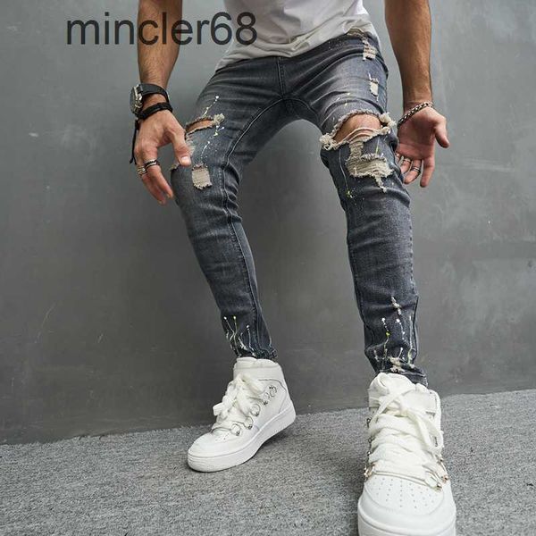 Jeans maschili jeans fashional casual sottili motociclisti in jeans pantaloni ginocchini hiphop strappato lavato in difficoltà