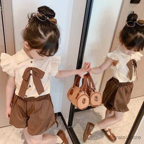 Set di abbigliamento 2024 Set per bambini Summer Small Flying Shirt Bud Pants But Abito a due pezzi NAMBINI NAMBINO Principesse Sport Suitsuit per bambini Abbigliamento