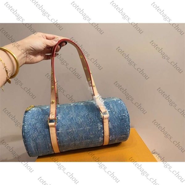 Designer -Tasche 2024 Neuer Denim Roller Roller Bag Fashion Diamant gemustertes Messengerbeutel Ein einzelner Umhängetasche tragbarer flauschiger Bag Crossbody Womens Casual Small Drum Bag