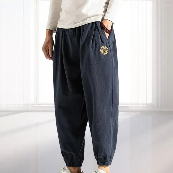 Pantaloni maschili in stile cinese sciolto casual sciolto caviglia bandato con tasche ricamate in vita elastica morbida traspirante per la primavera