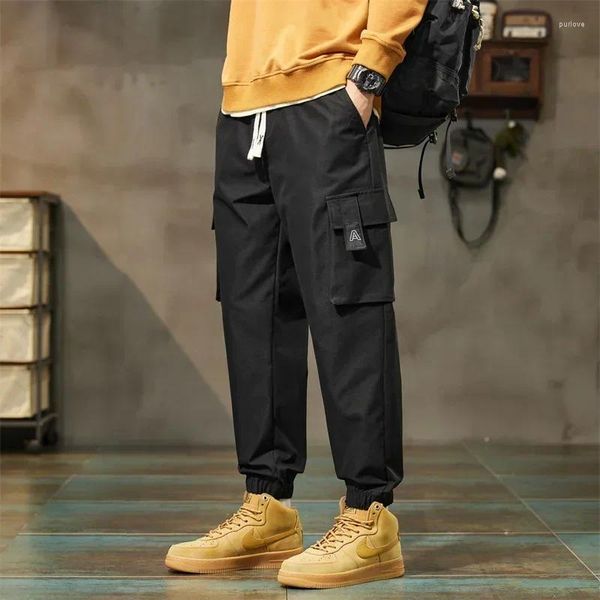 Calças masculinas Spring e Macacão de outono Loga Buncos casuais Cargo Tactical Streetwear calça masculino Roupas de grife de roupas