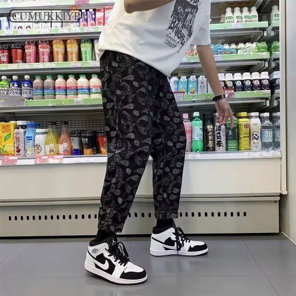 Pantaloni Cumukkiyp pantaloni casuali da uomo anacardi di fiore di fiore estate alla moda personalizzata gamba affusolata di alta strada pantaloni da jogging hiphop