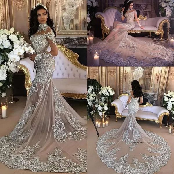 Sparkly Meerjungfrau Hochzeitskleid sexy schiere Bling Perlen Spitze Applikat hoher Nacken Illusion Langarm Champagner Trompete Brautkleid