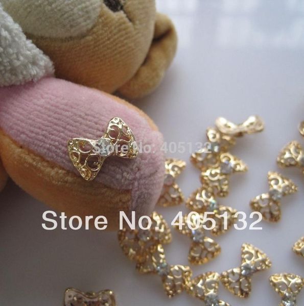 WHOLEMD603 3D 50PCSBAG Gold Bow Decoration Metal Shinny Deco Metal Nail Art Decoration3888351