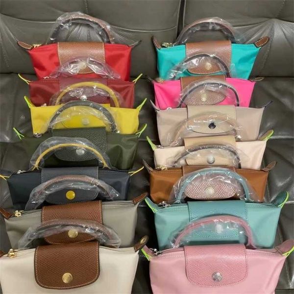 Designer de sacola portador de cartões de alta versão e pecão de alta qualidade para bolsas de capa de capa atacado Mini Meni Women Bolsas bolsas de praia