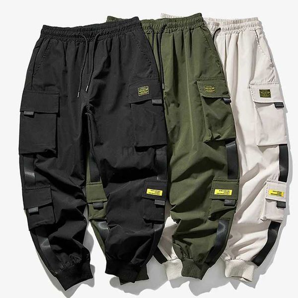 Calça masculina exército masculino verde calça de calça calça calças homens calças cargo de hip hop bolsões casuais calças de moletom de moda masculina size s-5x d240425