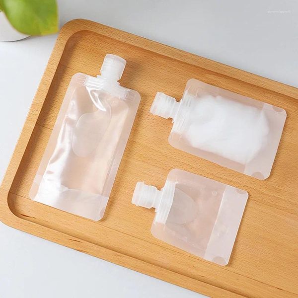 Aufbewahrungstaschen 5pcs tragbare Reisetasche Flüssigkeit Make -up Packung Transparente Flip -Kappe Verpackung Kunststoff Stand -up -Ausgabetasche