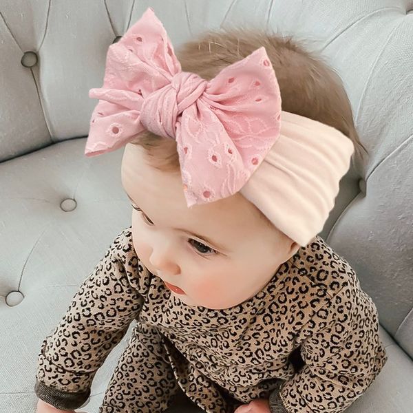 2024 Großhandelspreis schöne 10 Farben Baby Girl Hair Accessoires Heißverkauf Nylon Stirnband süße weiche Süßigkeiten Farbe Mädchen Kind Stirnband Bogenstil Haarbänder