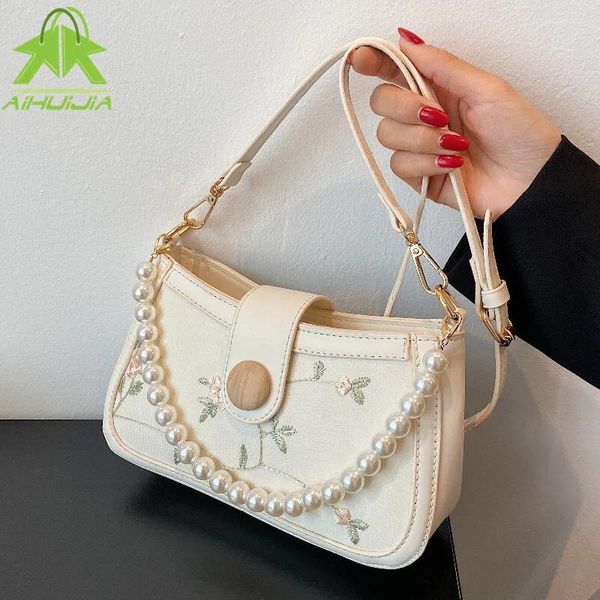 Bolsas de ombro da moda Pérola Pérola Bola Mulher Bolsa de Luxuja Bolsa de Luxo 2024 Pu Couro Bordado Mensageiro de Mulheres de Costura Bordado