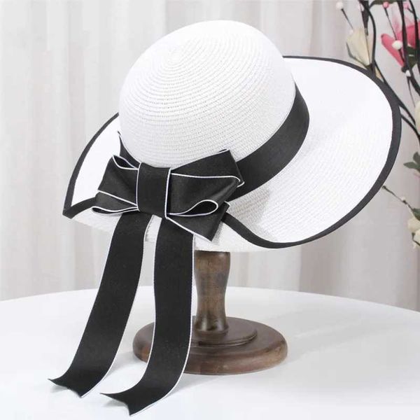 Cappelli larghi cappelli da secchio cappelli estivi stringhi alla moda largo brim leisure beach hat hat outdoor pieghevole blocco solare blocco UV protezione da donna pano