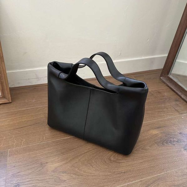 Der neue Südkoreaner Die Reihenkopfschicht Cowide Tote -Tasche ist einfach und große Kapazität Handtasche vielseitige echte Leder -Crossbody -Tasche FHYQ