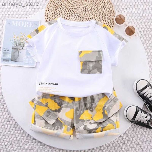 T-Shirts 2pcs Baby Set Childrens Summer Fashion Camouflage Gedruckte Patchwork-Ärmel Kurzärärmische Shorts Setl2404