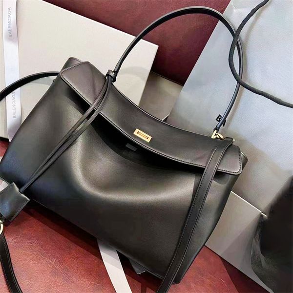 Sagniere di design di lusso per donna in pelle Pulnica maniglia top borsetta ad alta capacità Crossbody rodeo sacchetti da uomo tote frizione frizione cittadini ascella