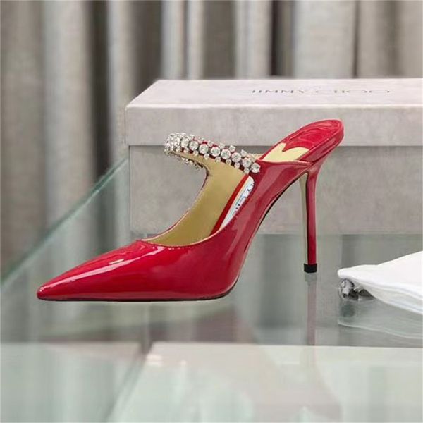 SOLOD PONTENDED SAPATOS DESENHECIMENTO DE MAPIDADE Damas de couro real Bombeias de decoração de metal de metal sapatos de festas novos calçados calçados de marca