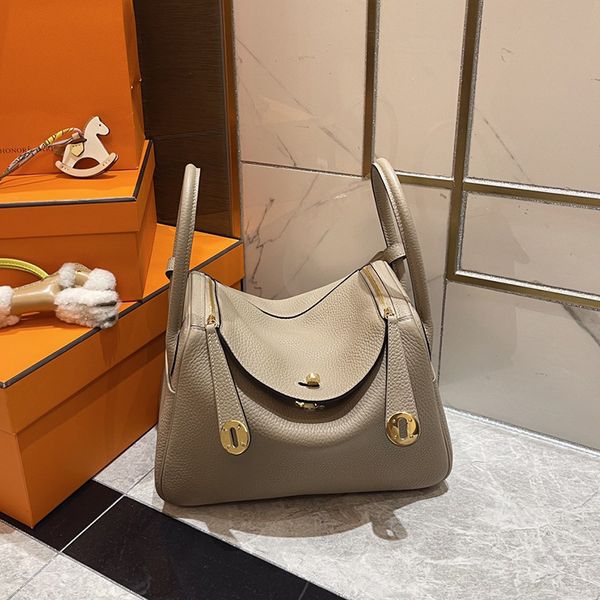 Дизайнерская кожаная сумка мешок для кросс -тела мини -сумочка TC Кожаная золото/серебряная застежка на искренний кожаный плечо упаковка