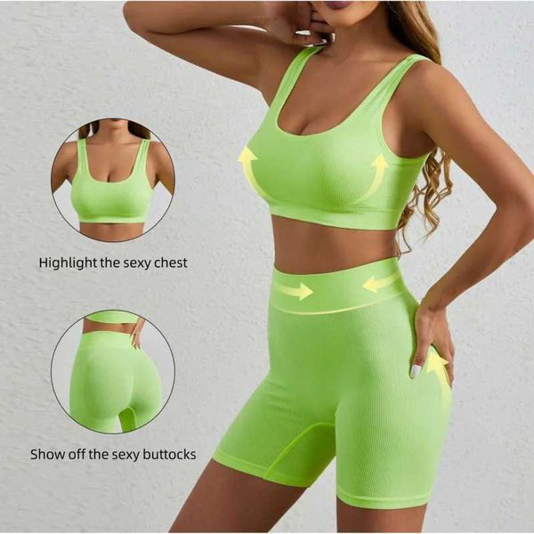 Frauen Tracksuits Neue Yoga Set Womens Set Peach Hip Hifting Hals hängende Sport BH Schockfeste Schnelltrocknende Shorts Set Womens Athletic Clothing 240424