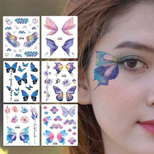 Tattoo Transfer Glitter Fairy Butterfly Wings Tattoo Aufkleber temporärer wasserdichte Augen Gesicht Arm Körperkunst gefälschte Tattoos Frauen Make -up -Produkte 240427